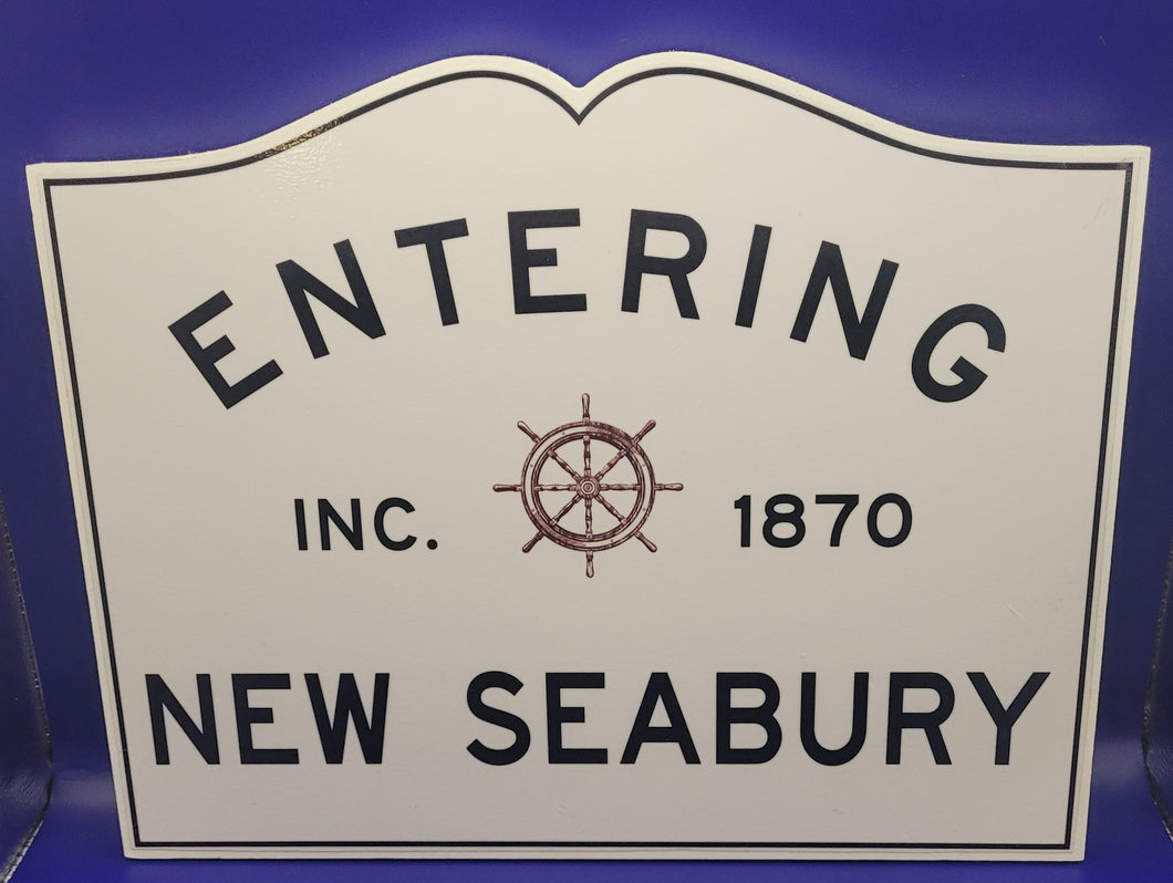 Entering New Seabury Sign with Ships Wheel