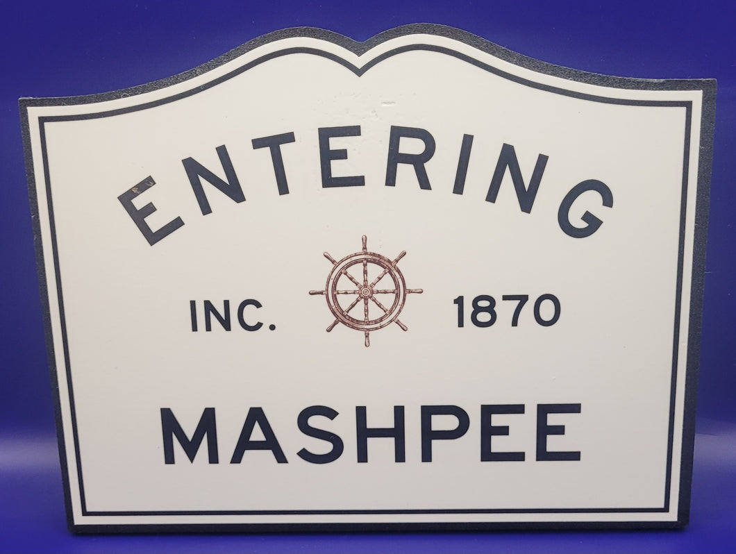 Entering Mashpee Sign with Ships Wheel